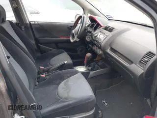 2007 Honda Fit z VIN JHMGD38437S010479, wystawiony jako IAAI lot #42302388 z przebiegiem 245 945 mil mil oraz . Historia ofert i sprzedaży dostępna na DreamBid. Obrazek 5.