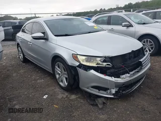 2014 Volkswagen CC R-Line with VIN WVWBP7AN5EE531776, listed as a IAAI auction lot 42124179 with 79,299 mi miles and . Bid and sale history available at DreamBid. Image 1.