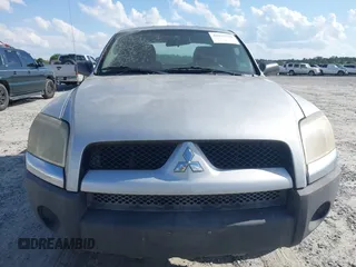 2007 Mitsubishi Raider LS with VIN 1Z7HC22K57S162987, listed as a IAAI auction lot 42015748 with 100,919 mi miles. Bid and sale history available at carsss.com. Image 6.