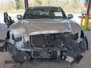 2018 Toyota Tacoma SR with VIN 3TMCZ5ANXJM146284, listed as a IAAI auction lot 42041525 with 103,143 mi miles and . Bid and sale history available at DreamBid. Image 6.