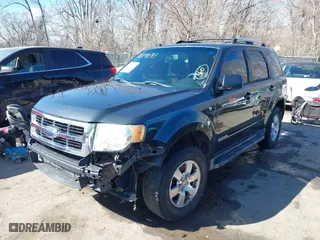 2008 Ford Escape Limited with VIN 1FMCU04188KB04056, listed as a IAAI auction lot 41679571 with 240,625 mi miles. Bid and sale history available at carsss.com. Image 2.