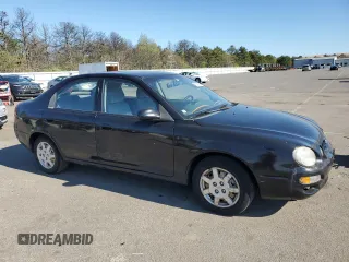 2001 Kia Spectra GS z VIN KNAFB161115036033, wystawiony jako Copart lot #55939335 z przebiegiem 76 414 mil mil oraz Szkoda całkowita • Salvage title. Historia ofert i sprzedaży dostępna na DreamBid. Obrazek 4.