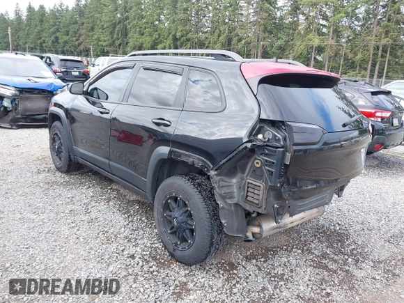 2014 Jeep Cherokee Trailhawk z VIN 1C4PJMBB1EW145683, wystawiony jako IAAI lot #42487730 z przebiegiem 148 277 mil mil oraz . Historia ofert i sprzedaży dostępna na DreamBid. Obrazek 3.