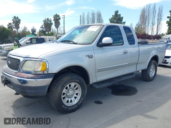 2001 Ford F-150 XL with VIN 1FTRX18L91KF29881, listed as a IAAI auction lot 42021554 with 199,041 mi miles. Bid and sale history available at carsss.com. Image 2.