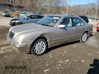 2000 Mercedes-Benz E-Class with VIN WDBJF65J4YB116601, listed as a Copart auction lot 50525845 with 143,324 mi miles and Salvage Title. Bid and sale history available at carsss.com. Image 1.