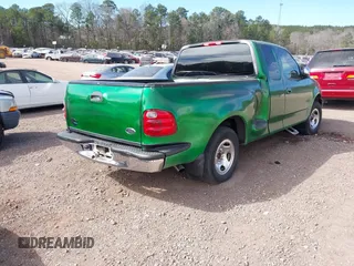 2001 Ford F-150 XL with VIN 2FTRX07WX1CA79197, listed as a IAAI auction lot 41655618 with 267,846 mi miles. Bid and sale history available at carsss.com. Image 4.