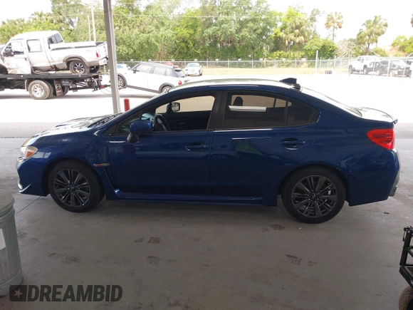 2015 Subaru WRX with VIN JF1VA1A60F9833285, listed as a IAAI auction lot 42127612 with 100,035 mi miles and . Bid and sale history available at DreamBid. Image 14.