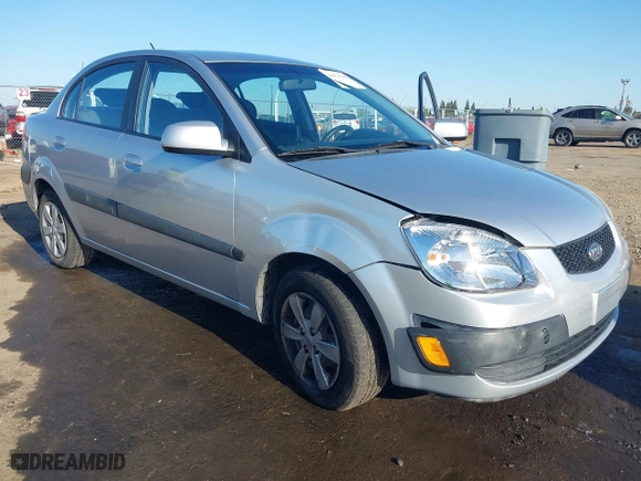 2009 Kia Rio SX with VIN KNADE223296523842, listed as a IAAI auction lot 42024905 with 98,613 mi miles. Bid and sale history available at carsss.com. Image 6.
