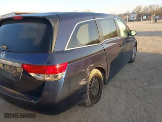 2014 Honda Odyssey LX with VIN 5FNRL5H27EB060223, listed as a IAAI auction lot 41771269 with 156,169 mi miles. Bid and sale history available at carsss.com. Image 4.