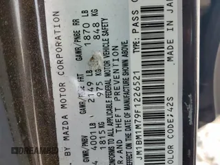 2015 Mazda 3 i Grand Touring with VIN JM1BM1M79F1226521, listed as a Copart auction lot 60328335 with 104,079 mi miles and Salvage title. Bid and sale history available at DreamBid. Image 12.