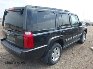 2007 Jeep Commander Sport with VIN 1J8HG48K17C651084, listed as a IAAI auction lot 42064395 with 212,057 mi miles. Bid and sale history available at carsss.com. Image 4.