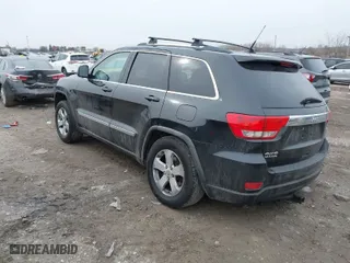 2011 Jeep Grand Cherokee Laredo with VIN 1J4RR4GGXBC511475, listed as a IAAI auction lot 41554620 with 164,361 mi miles. Bid and sale history available at carsss.com. Image 3.
