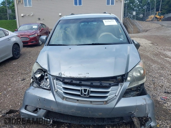 2010 Honda Odyssey EX with VIN 5FNRL3H4XAB015955, listed as a IAAI auction lot 42590535 with Not provided miles and . Bid and sale history available at DreamBid. Image 11.