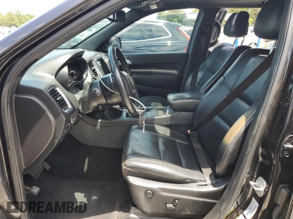 2015 Dodge Durango R/T with VIN 1C4SDHCT3FC907348, listed as a Copart auction lot 59880905 with 141,162 mi miles and Salvage title. Bid and sale history available at DreamBid. Image 7.