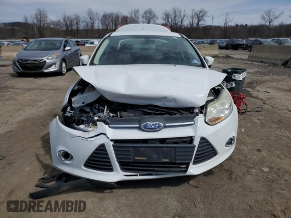 2012 Ford Focus SE with VIN 1FAHP3F25CL213172, listed as a Copart auction lot 51518755 with 67,520 mi miles and Salvage Title. Bid and sale history available at carsss.com. Image 5.