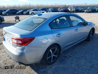 2023 Subaru Impreza Premium with VIN 4S3GKAD65P3606190, listed as a IAAI auction lot 41003890 with 15,720 mi miles and . Bid and sale history available at DreamBid. Image 4.