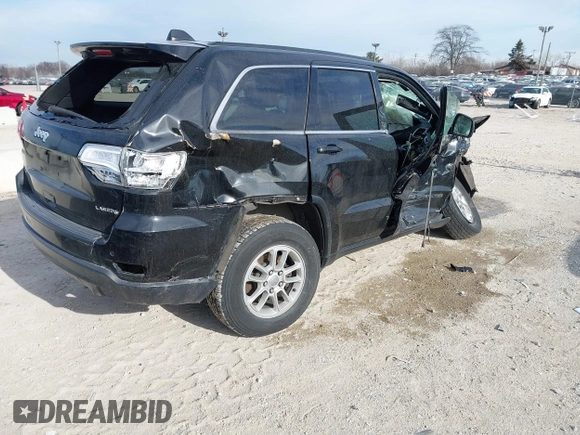 2018 Jeep Grand Cherokee Laredo E with VIN 1C4RJFAG7JC244103, listed as a IAAI auction lot 41260642 with 116,797 mi miles. Bid and sale history available at carsss.com. Image 4.