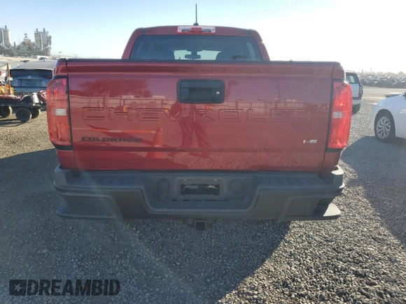 2021 Chevrolet Colorado 2WD Work Truck with VIN 1GCGSBEN0M1174272, listed as a Copart auction lot 84538594 with 58,052 mi miles and Salvage title. Bid and sale history available at DreamBid. Image 6.