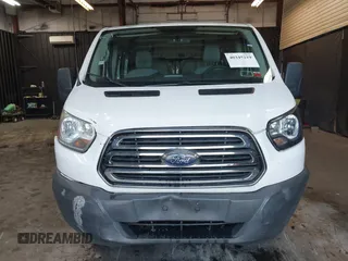 2015 Ford Transit Cargo with VIN 1FTNR1ZM4FKA33796, listed as a IAAI auction lot 40345219 with 95,972 mi miles and . Bid and sale history available at DreamBid. Image 6.