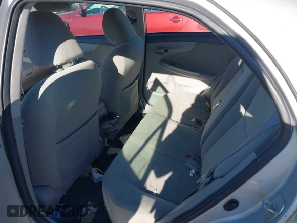 2010 Toyota Corolla with VIN 2T1BU4EE9AC322961, listed as a IAAI auction lot 40879803 with 146,996 mi miles and . Bid and sale history available at DreamBid. Image 8.