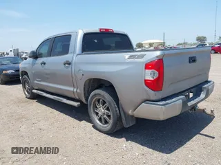 2014 Toyota Tundra SR5 z VIN 5TFEM5F15EX068560, wystawiony jako IAAI lot #42265351 z przebiegiem 163 294 mil mil oraz . Historia ofert i sprzedaży dostępna na DreamBid. Obrazek 3.