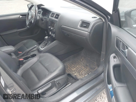 2014 Volkswagen Jetta TDI with VIN 3VWLL7AJ0EM389924, listed as a IAAI auction lot 41271290 with 241,452 mi miles and . Bid and sale history available at DreamBid. Image 5.