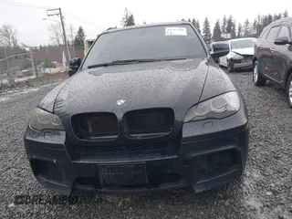 2010 BMW X5 M with VIN 5YMGY0C59ALK25572, listed as a IAAI auction lot 41712140 with 163,226 mi miles. Bid and sale history available at carsss.com. Image 6.