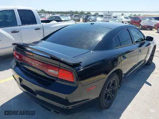 2014 Dodge Charger SXT with VIN 2C3CDXHG0EH207166, listed as a IAAI auction lot 41929294 with 182,392 mi miles. Bid and sale history available at carsss.com. Image 4.
