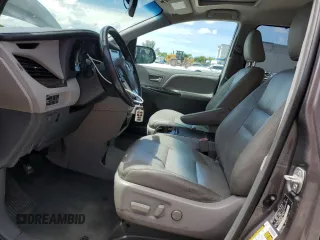 2015 Toyota Sienna XLE with VIN 5TDYK3DCXFS668851, listed as a Copart auction lot 60452005 with 205,549 mi miles and Salvage title. Bid and sale history available at DreamBid. Image 7.