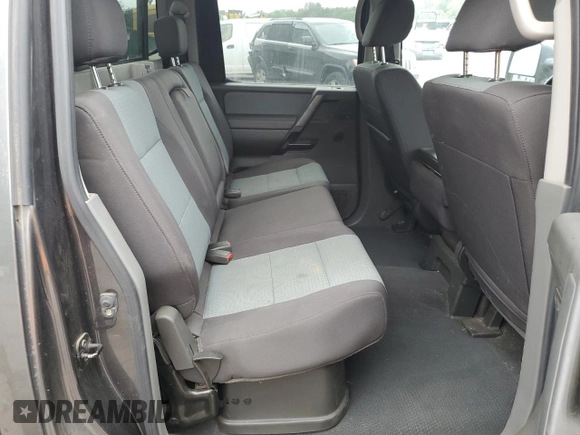 2007 Nissan Titan SE with VIN 1N6AA07B87N201924, listed as a Copart auction lot 60361425 with 167,659 mi miles and Salvage title. Bid and sale history available at DreamBid. Image 10.