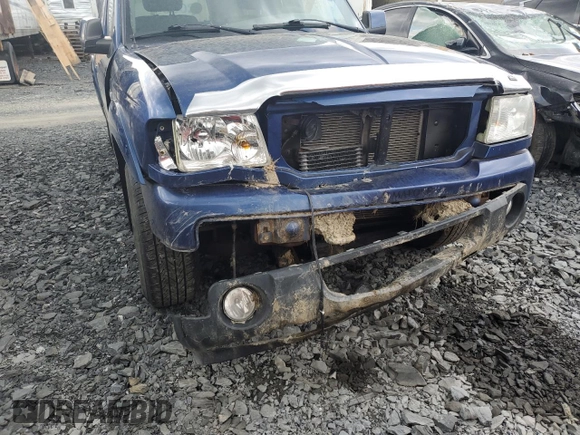 2010 Ford Ranger XLT with VIN 1FTKR4EE4APA36387, listed as a Copart auction lot 56661415 with 226,688 mi miles and Salvage title. Bid and sale history available at DreamBid. Image 12.