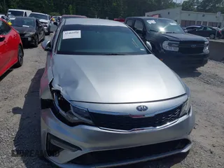 2020 Kia Optima LX with VIN 5XXGT4L3XLG429961, listed as a IAAI auction lot 42483950 with 97,677 mi miles and . Bid and sale history available at DreamBid. Image 12.