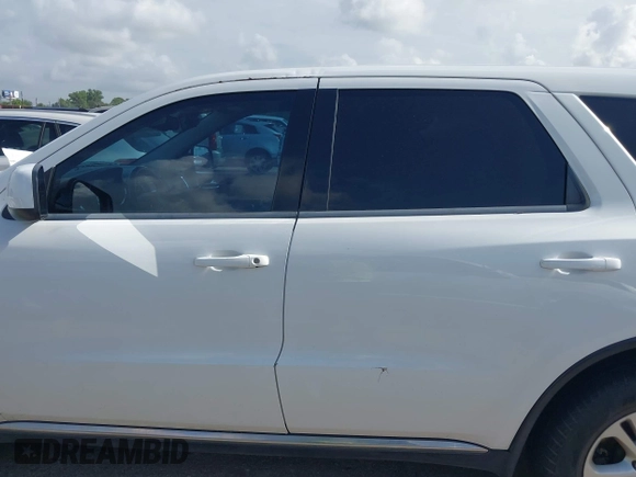 2013 Dodge Durango SXT with VIN 1C4RDHAG4DC667776, listed as a IAAI auction lot 42656299 with 204,181 mi miles and . Bid and sale history available at DreamBid. Image 14.