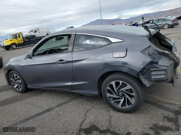 2016 Honda Civic Coupe LX-P with VIN 2HGFC4B03GH305795, listed as a Copart auction lot 82310524 with 130,370 mi miles and Salvage Title. Bid and sale history available at carsss.com. Image 2.