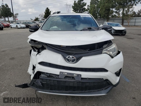 2016 Toyota RAV4 SE with VIN 2T3NFREV4GW263191, listed as a Copart auction lot 54722135 with Not provided miles and Salvage title. Bid and sale history available at DreamBid. Image 5.