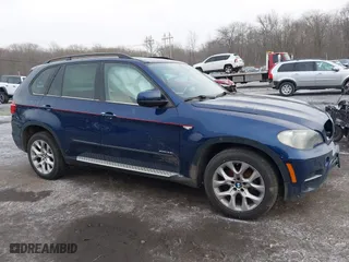 2011 BMW X5 35i with VIN 5UXZV4C54BL738262, listed as a IAAI auction lot 41633474 with 173,914 mi miles. Bid and sale history available at carsss.com. Image 13.