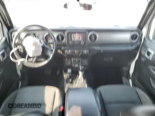 2020 Jeep Wrangler Unlimited Freedom with VIN 1C4HJXDG9LW238432, listed as a Copart auction lot 59087435 with 92,093 mi miles and Salvage title. Bid and sale history available at DreamBid. Image 8.