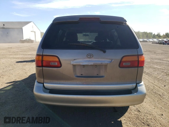 1998 Toyota Sienna LE with VIN 4T3ZF13C5WU049992, listed as a Copart auction lot 74492774 with 174,751 mi miles and Salvage Title. Bid and sale history available at carsss.com. Image 6.