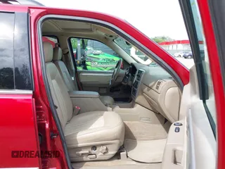 2004 Mercury Mountaineer Convenience z VIN 4M2DU86W14UJ06529, wystawiony jako IAAI lot #42206974 z przebiegiem 129 812 mil mil oraz . Historia ofert i sprzedaży dostępna na DreamBid. Obrazek 5.