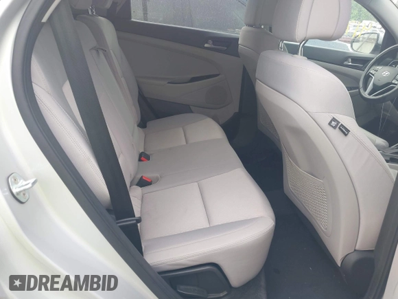 2017 Hyundai Tucson SE with VIN KM8J3CA44HU585714, listed as a IAAI auction lot 42097980 with 96,483 mi miles. Bid and sale history available at carsss.com. Image 8.