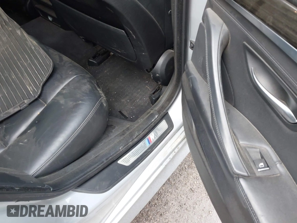 2015 BMW 5 Series 535i xDrive with VIN WBA5B3C50FD544036, listed as a IAAI auction lot 41902652 with 184,735 mi miles. Bid and sale history available at carsss.com. Image 8.
