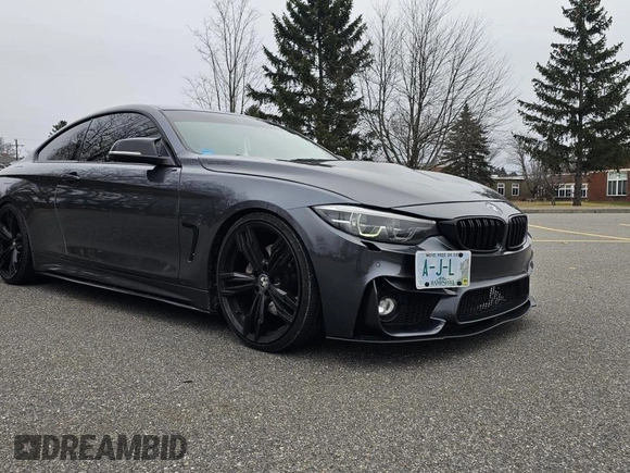 2015 BMW 4 Series 435i xDrive with VIN WBA3R5C55FK371639, listed as a Copart auction lot 56732715 with 122,559 mi miles and Clean title. Bid and sale history available at DreamBid. Image 2.