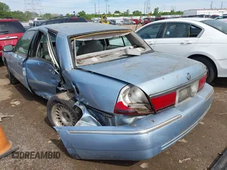 2000 Mercury Grand Marquis LS z VIN 2MEFM75W2YX740018, wystawiony jako IAAI lot #42255754 z przebiegiem 318 651 mil mil oraz . Historia ofert i sprzedaży dostępna na DreamBid. Obrazek 3.
