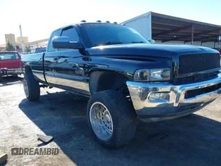 2001 Dodge Ram 2500 with VIN 1B7KF23651J595099, listed as a IAAI auction lot 40655074 with 244,480 mi miles. Bid and sale history available at carsss.com. Image 1.