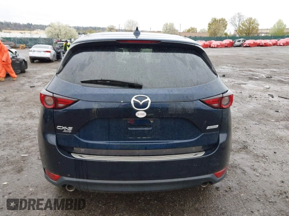 2019 Mazda CX-5 Grand Touring with VIN JM3KFBDM6K0592496, listed as a IAAI auction lot 41730103 with Not Provided miles and . Bid and sale history available at carsss.com. Image 15.