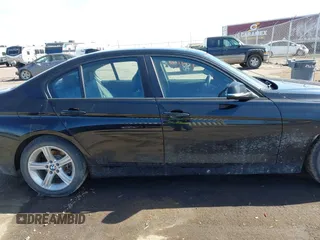 2015 BMW 3 Series 320i with VIN WBA3B1C58F5A05933, listed as a IAAI auction lot 41749755 with Not Provided miles. Bid and sale history available at carsss.com. Image 12.