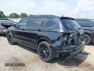 2021 Volkswagen Tiguan SE z VIN 3VV3B7AX0MM047478, wystawiony jako IAAI lot #42144239 z przebiegiem 55 468 mil mil oraz . Historia ofert i sprzedaży dostępna na DreamBid. Obrazek 3.