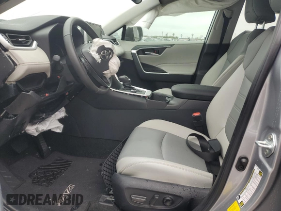 2024 Toyota RAV4 Hybrid XLE Premium with VIN 4T3B6RFV9RU167402, listed as a Copart auction lot 89083875 with 5,923 mi miles and Salvage Title. Bid and sale history available at DreamBid. Image 7.