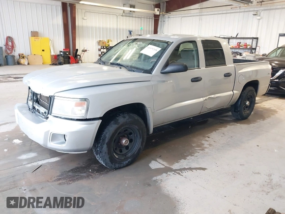 2008 Dodge Dakota SLT with VIN 1D7HW48N18S562245, listed as a IAAI auction lot 40939208 with 230,571 mi miles and . Bid and sale history available at DreamBid. Image 2.