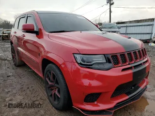 2020 Jeep Grand Cherokee Trackhawk with VIN 1C4RJFN95LC334610, listed as a Copart auction lot 49160944 with 23,348 mi miles and Salvage title. Bid and sale history available at DreamBid. Image 4.